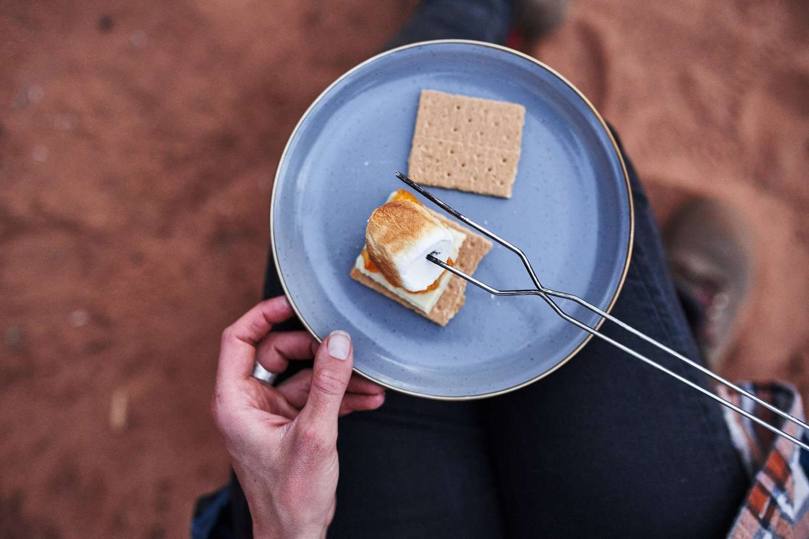 Making s’mores while camping