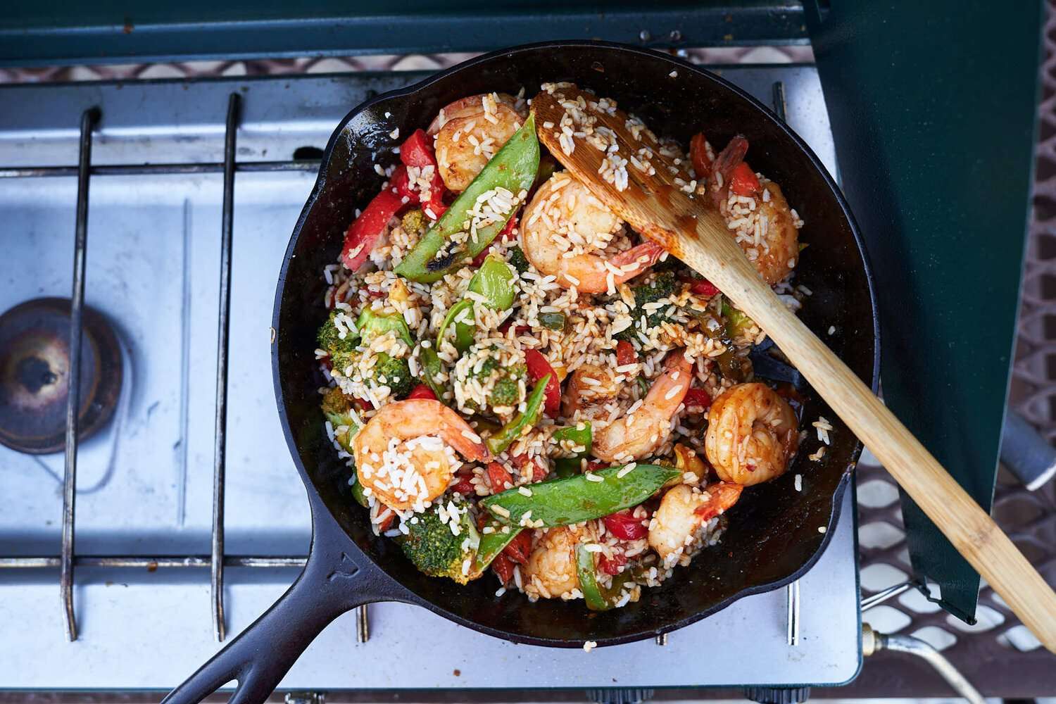 shrimp and veggie stir fry in a cast iron skillet 