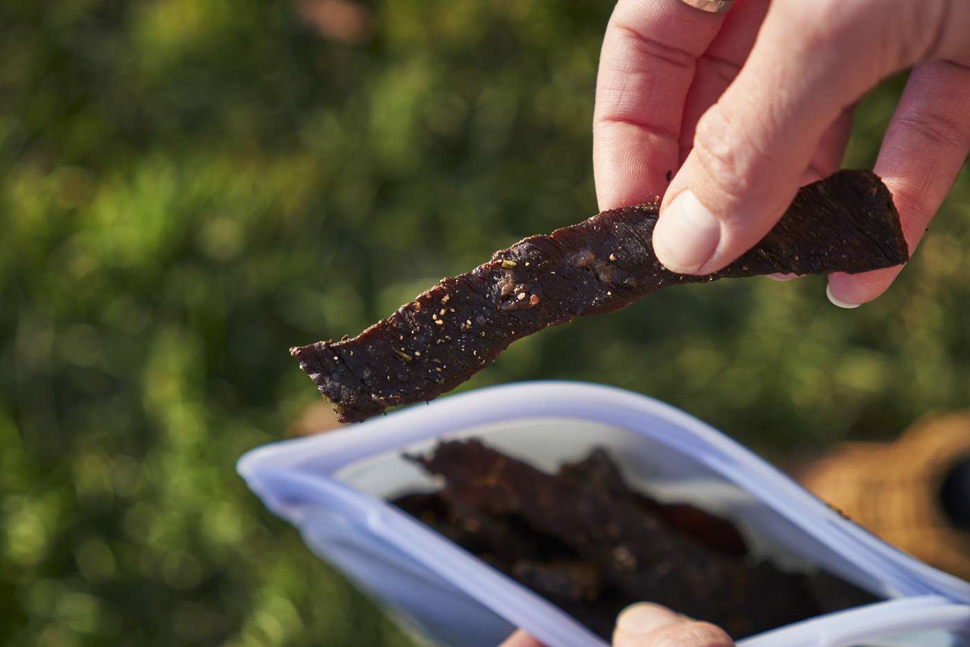 a piece of beef jerky for a camping snack