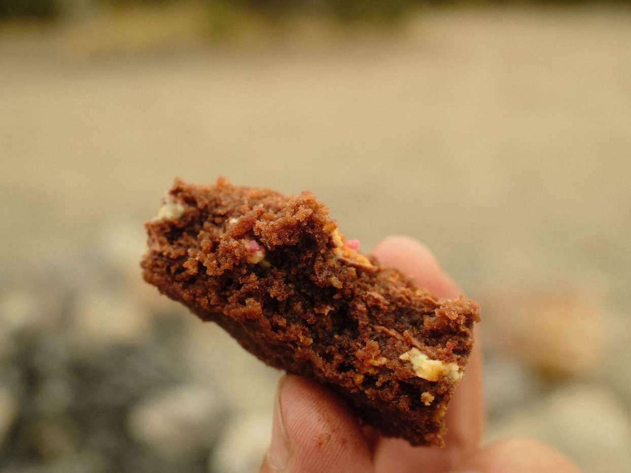 close up of one piece of a dutch oven chocolate peppermint cookie bar 