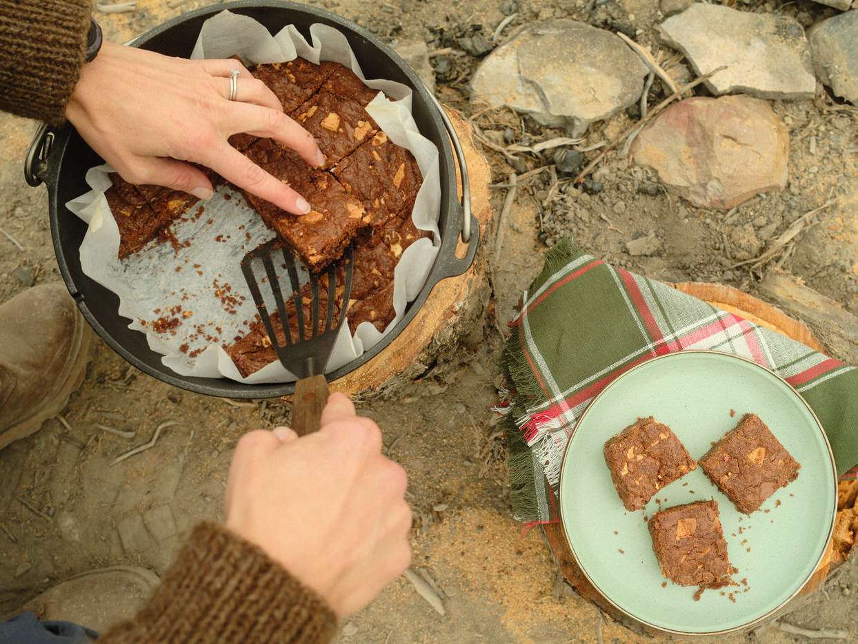 serving cookie bars on a plate while camping 