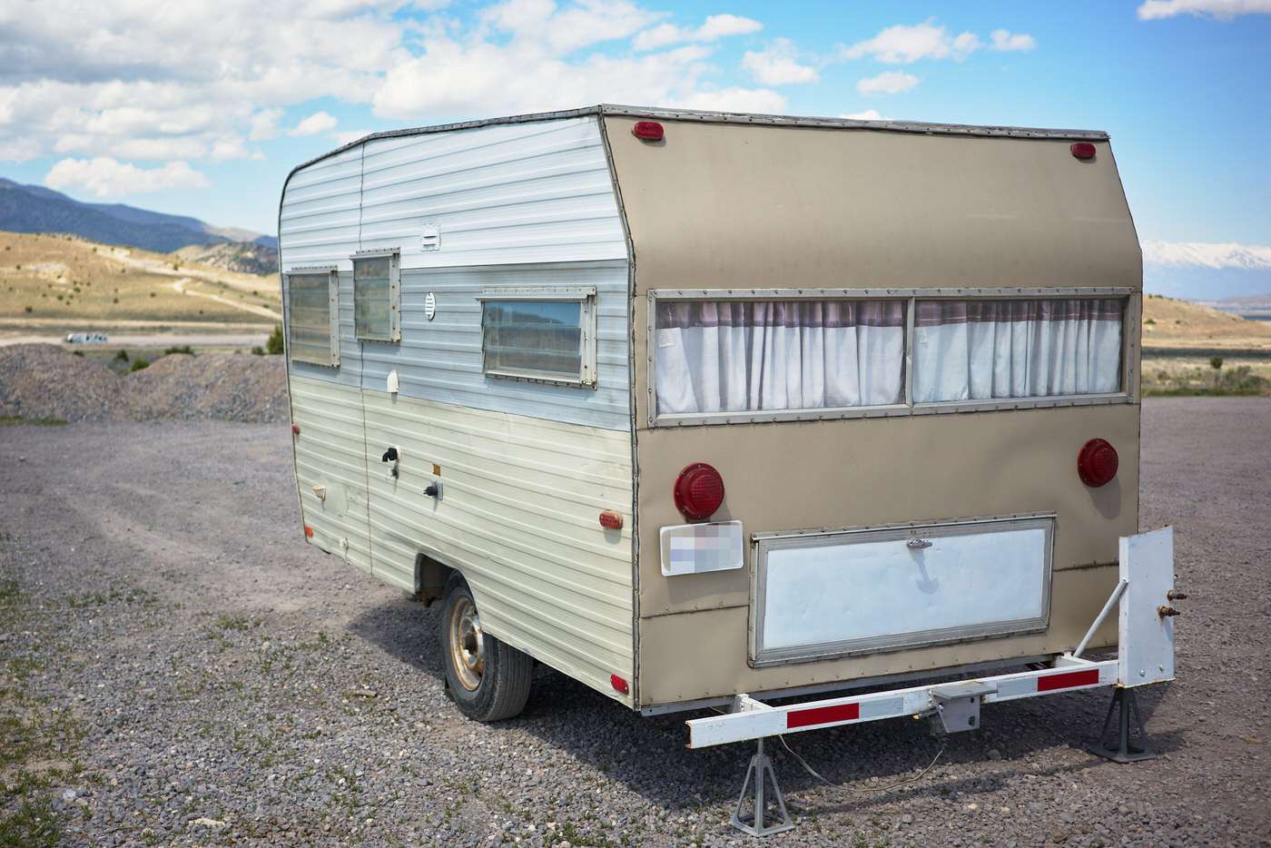 original back and side exterior of our vintage camping trailer before renovations
