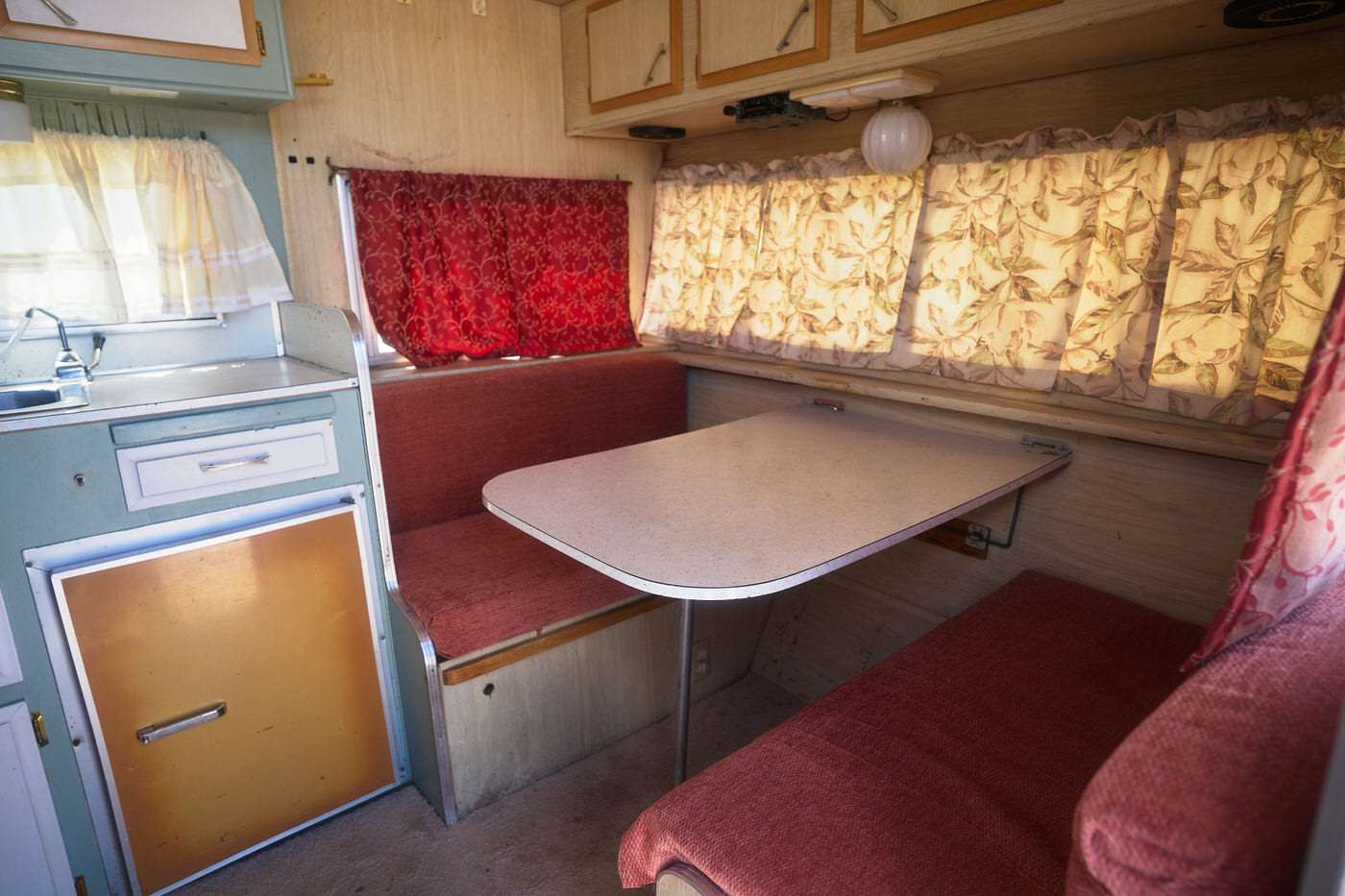 vintage camping trailer table area before renovation