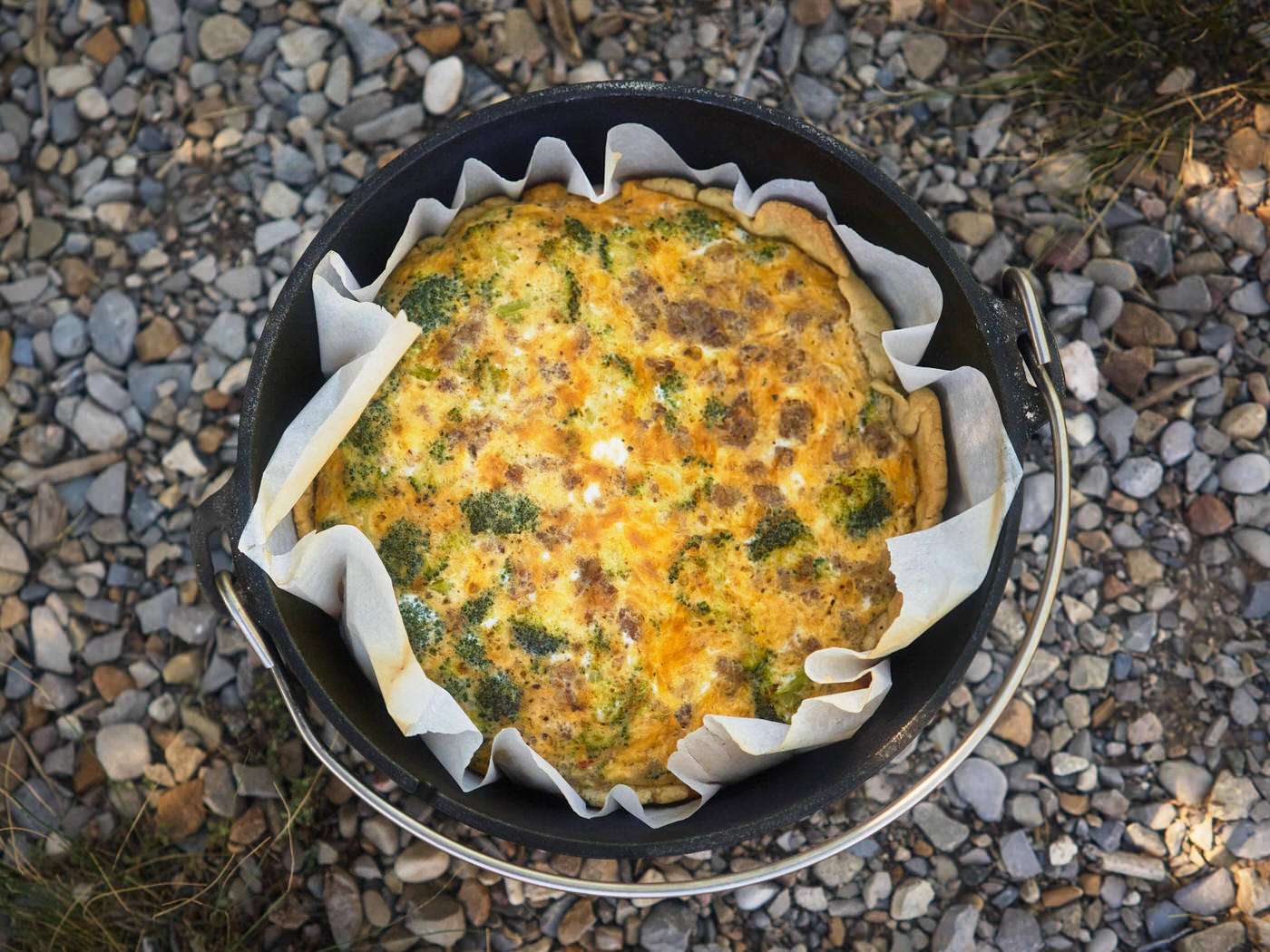 cooked dutch oven quiche camping breakfast