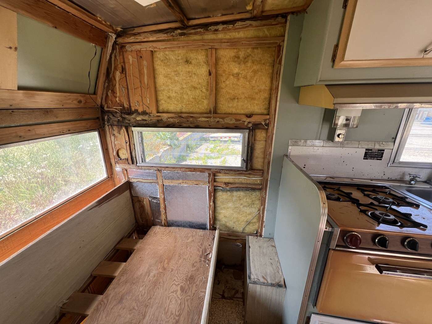 water damage near the window in our 1960s vintage camping trailer 