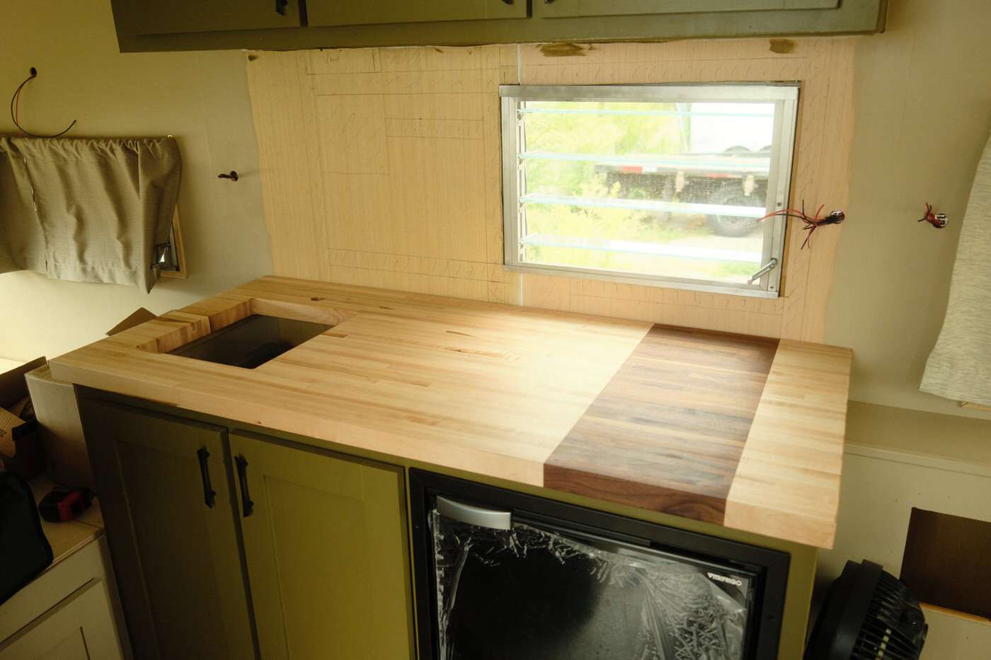 butcher block installed in 1960's small camper kitchen remodel