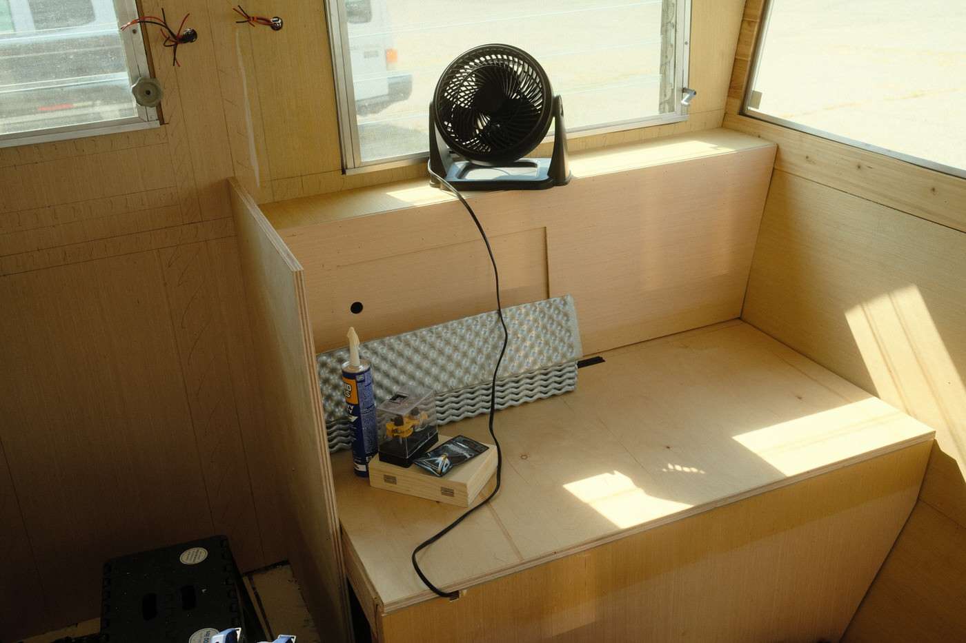 the new interior benches in a 1960s vintage trailer