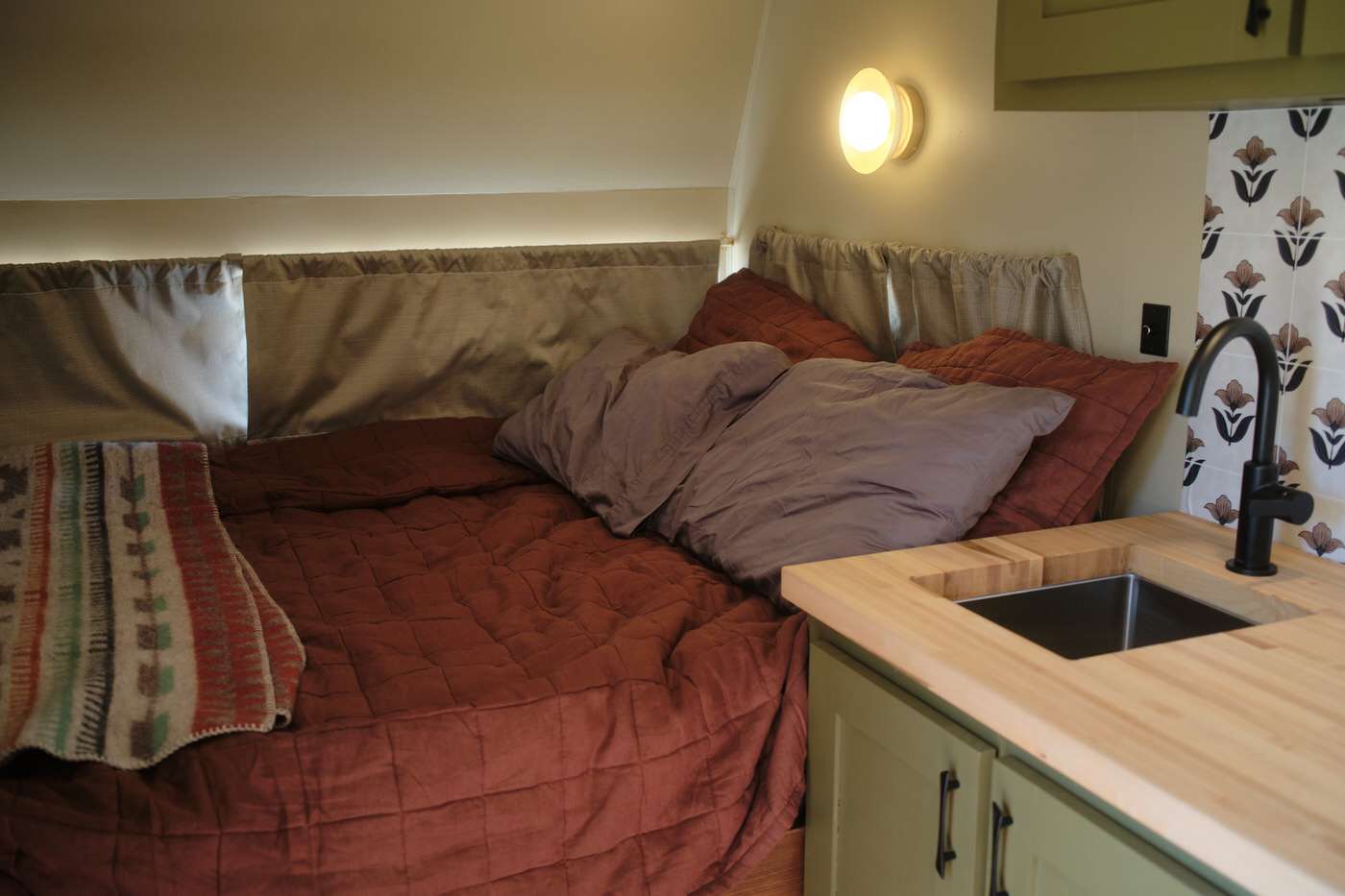 small camper bed design inside our 1960s vintage camper renovation