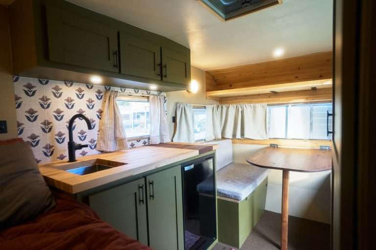 Small Camper Interior Design: Bed, Table, Flooring & Curtains