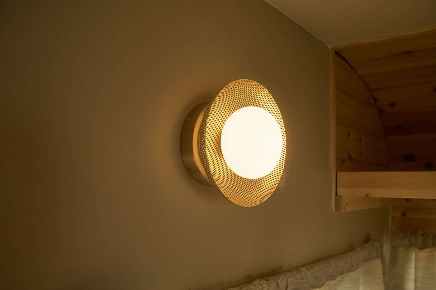 close up of new wall lights in a 1960s vintage camper makeover