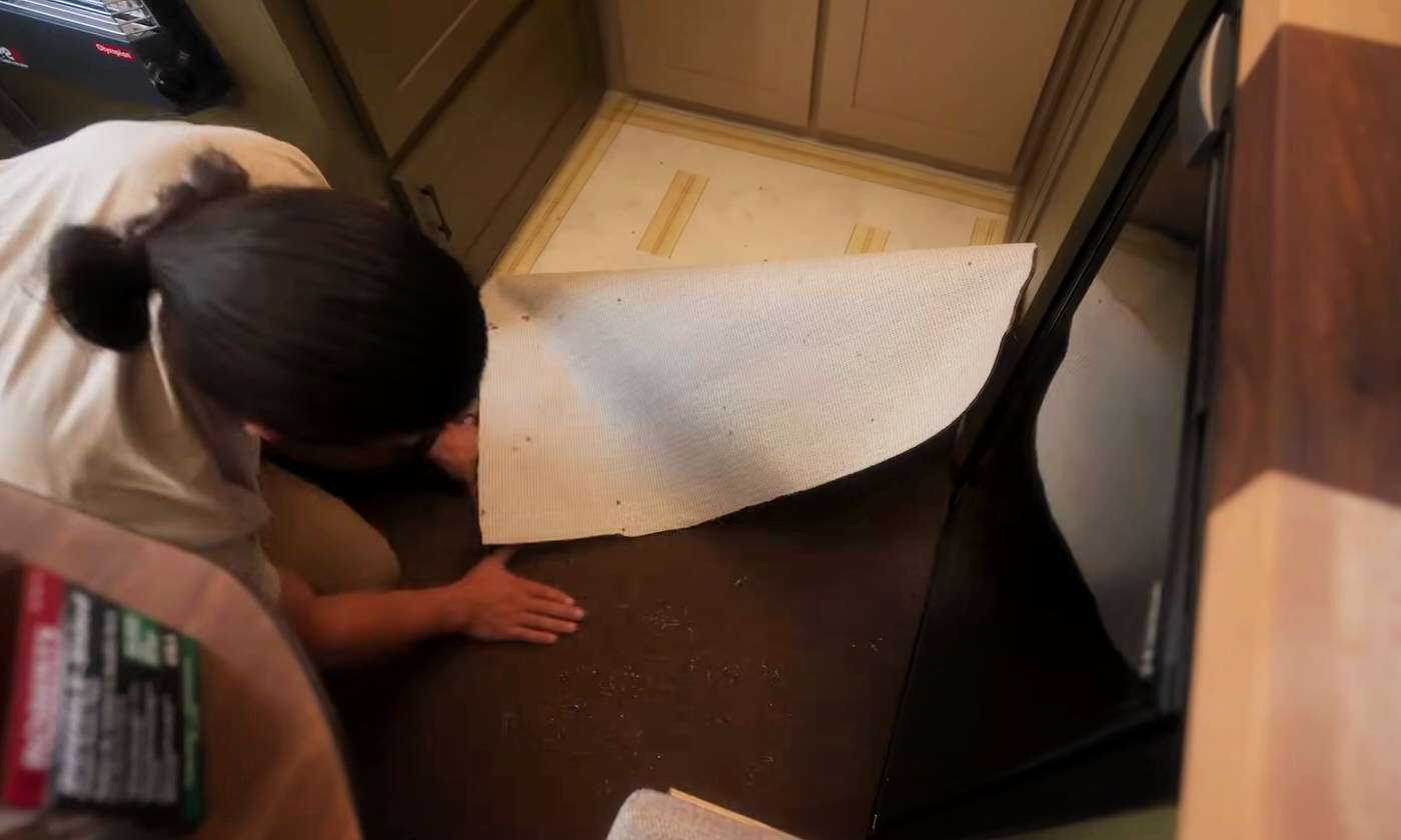 installing new carpet in a 1960s vintage camping trailer