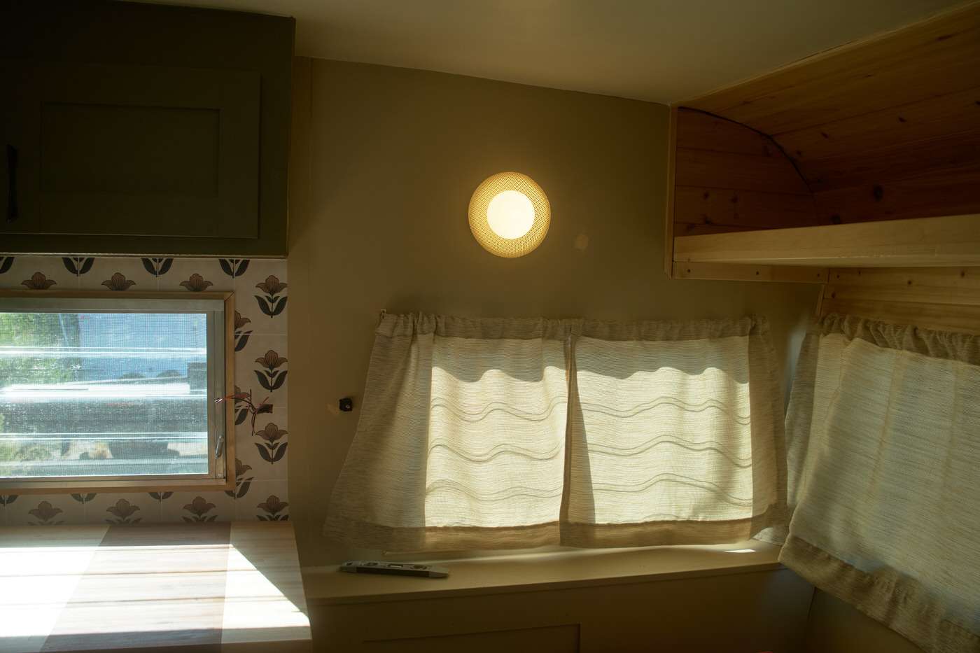 Curtains in a small camper interior adding privacy and style