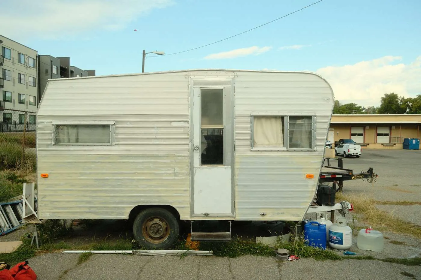 Exterior of a 1960s vintage camper during renovation before new paint